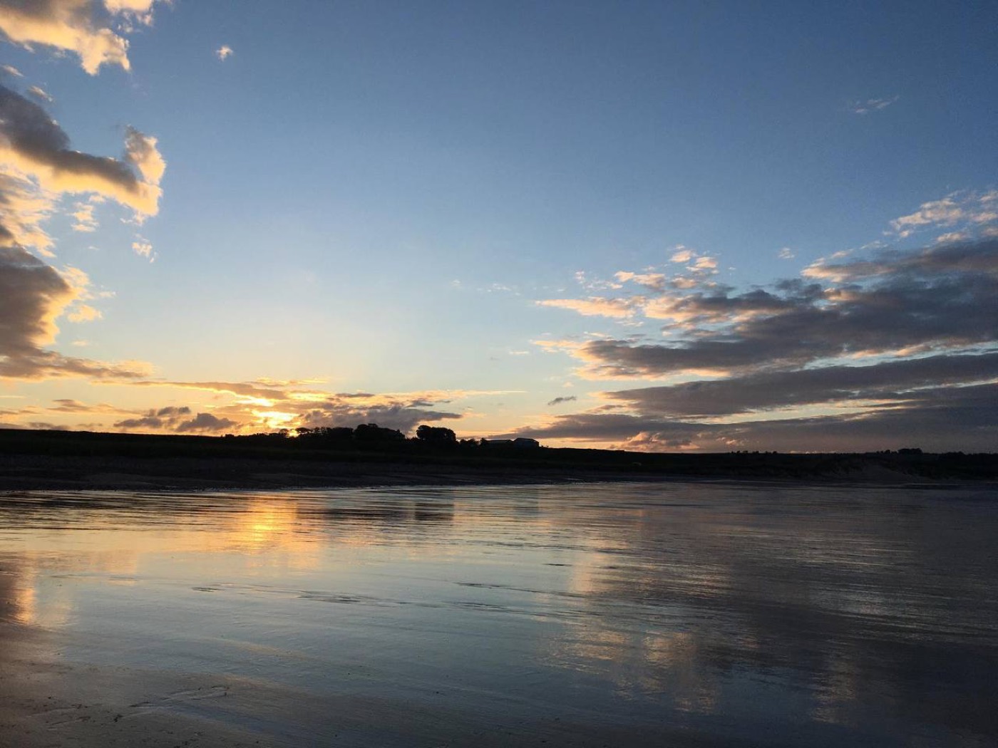 Wet sand at Lunan Bay